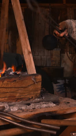 blacksmith at work in a historical forge