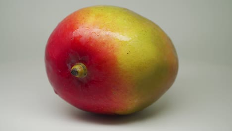 Beautiful-And-Totally-Mouthwatering-Freshly-Picked-Sweet-Mango-On-The-Table---Close-Up-Shot