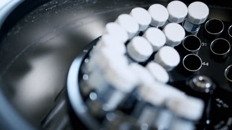 medical samples in test tubes, placed in centrifuge waiting to undergo testing