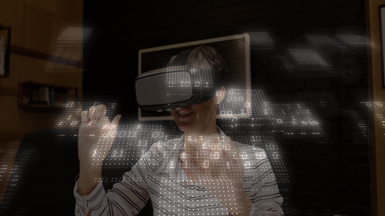 Woman using virtual reality headset gesturing inside tech office, showing floating code holograms