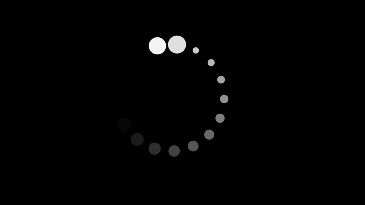 Work in Progress indicator Icon of Circling White Dots on Black Screen