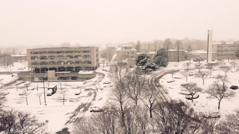 Vista-Aérea-De-Una-Tormenta-De-Nieve-Masiva-En-La-Ciudad-De-Owen-Sound,-Ontario,-Canadá