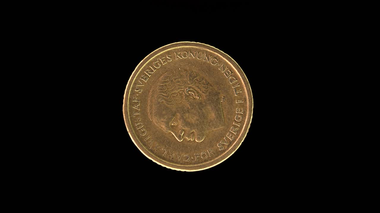 Sweden 1991 10 kronor coin obverse featuring portrait of King Carl XVI Gustaf rotating on black background