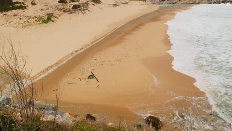 Plastic-ocean-pollution-waste,-trash-on-the-beach