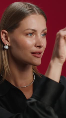 woman applying makeup