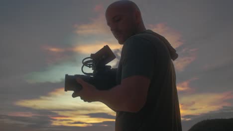 videographer at sunset