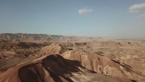 israel aerial drone of middle eastern camel owners in desert convoy tourism