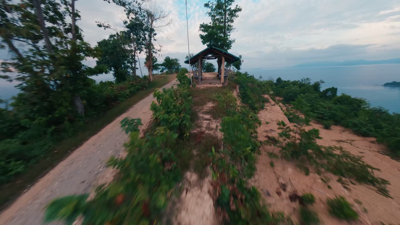 Cinematic FPV Drone Flight Over Rugged Coastline and Turquoise Waters at Hundred Steps Beach in San Vicente, Palawan, Philippines – Horizontal Aerial Scene