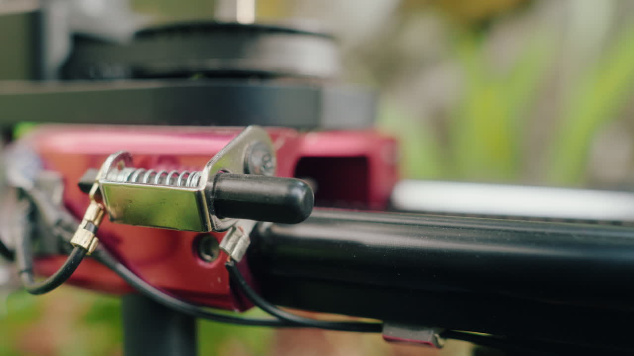 Closeup shallow focus shot of motorized slider moving back and forth smoothly