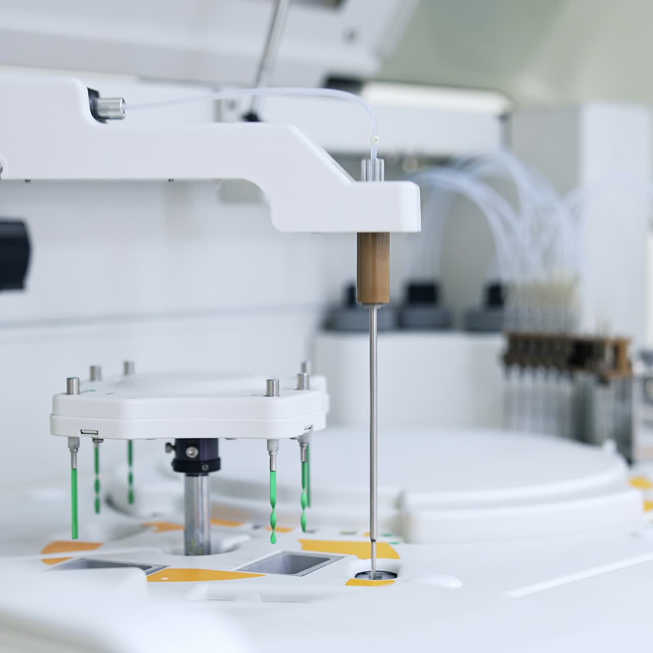 Some parts of modern equipment moving and carrying the blood test. Advanced technological appliances for science test and analysis