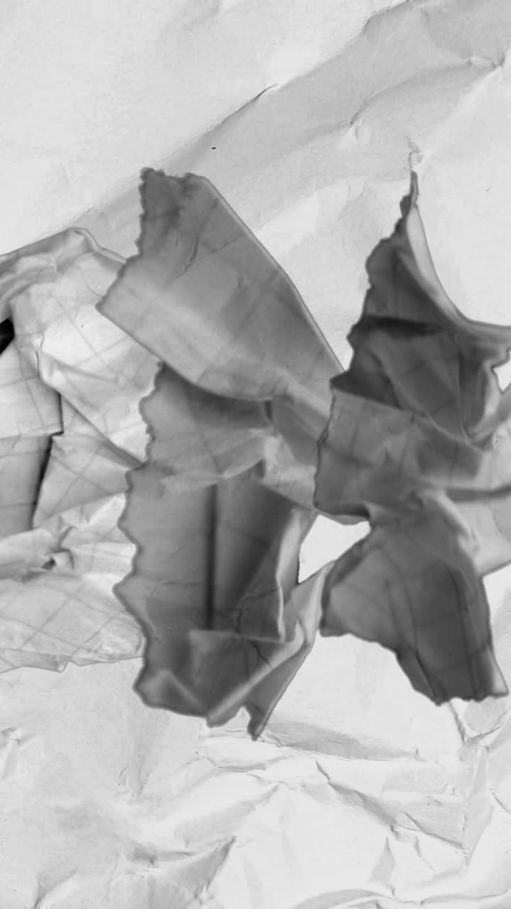 Dynamic Crumpled Paper Texture with Black and Red Transitions