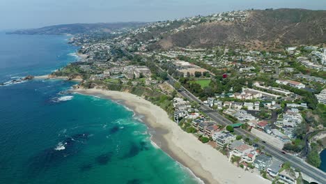 Aerial-view-of-the-Pacific-Coast-Highway-and-the-Laguna-Beach-coastline,-in-Orange-County-California