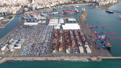 Port of Malaga aerial view full of containers and vehicles Spain