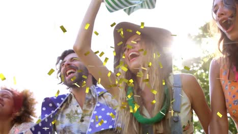 animation of gold confetti falling over crowd of people having fun at music concert