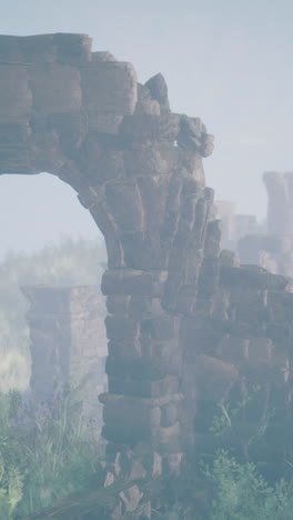 ancient stone ruins emerge from misty landscape in a serene atmosphere