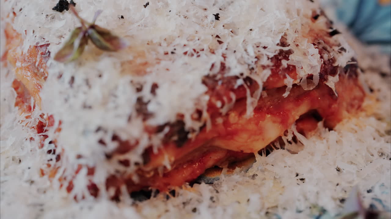 Close up of a lasagna dish on a plate at a restaurant