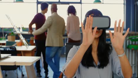 executive using virtual reality headset in the office 4k