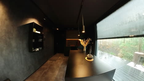 modern interior with panoramic nature view on a rainy day