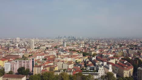 endless cityscape of milan city, aerial drone ascend view