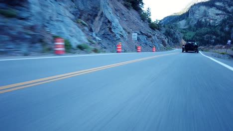 Low-angle-POV-footage-of-driving-in-the-mountains-of-Colorado