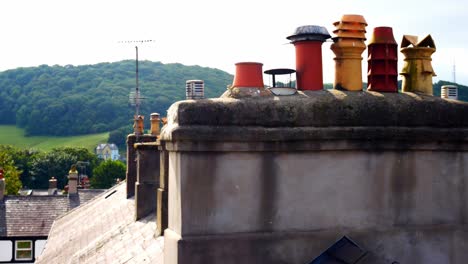 tiled victorian property rooftop chimney smoke stacks conwy town northwest wales