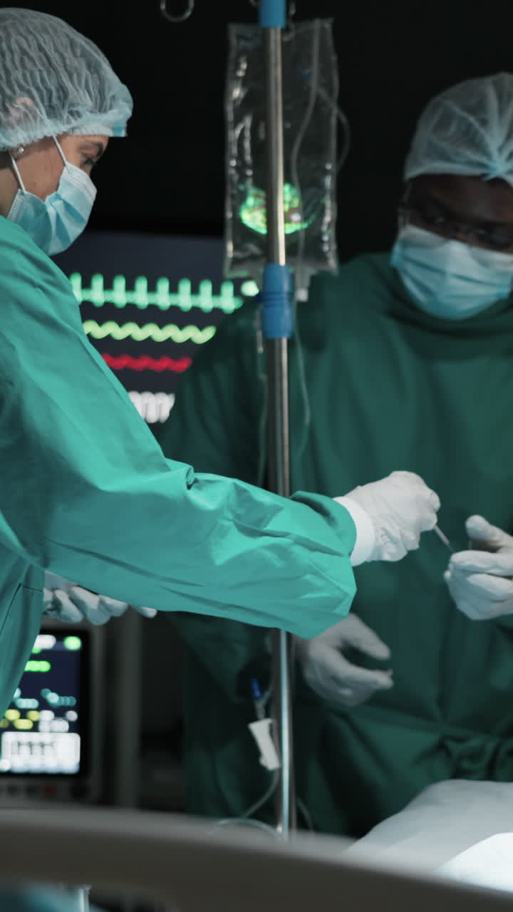 Surgeons Performing a Complex Operation in a Sterile Operating Room