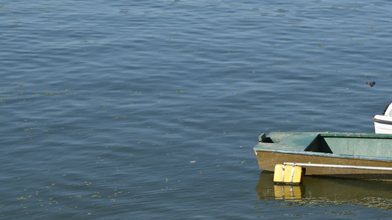 Fishing boat on river water