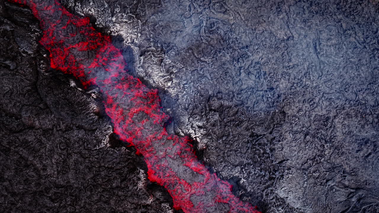 Flowing lava on Etna, Sicily, creates a dramatic and fiery scene