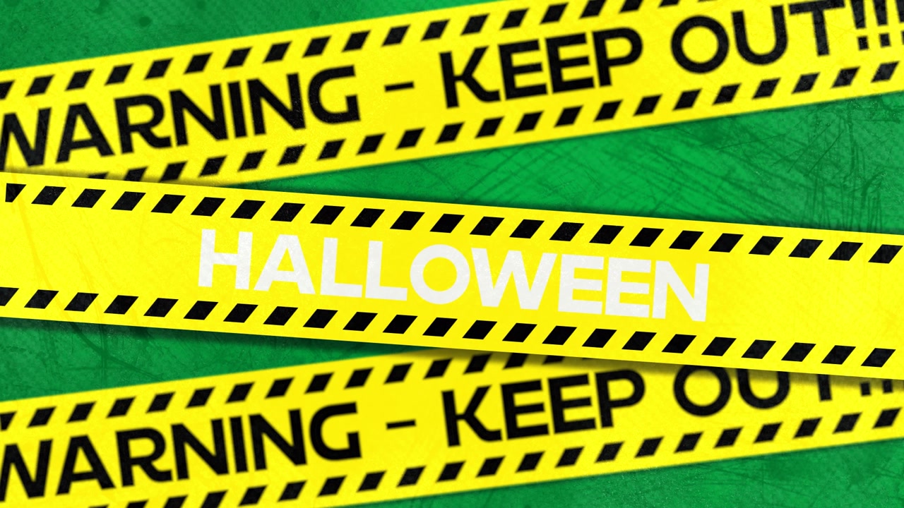 Halloween Warning Tape Animation on Green Background