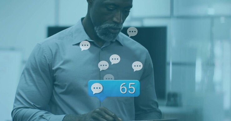 Manager tapping tablet and monitoring message flow with rising chat icons and notification counter