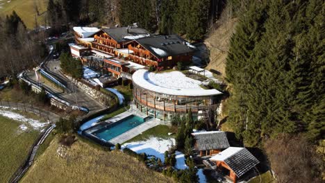 luxurious snowy wooden hotel in the northen alpine italy mountains