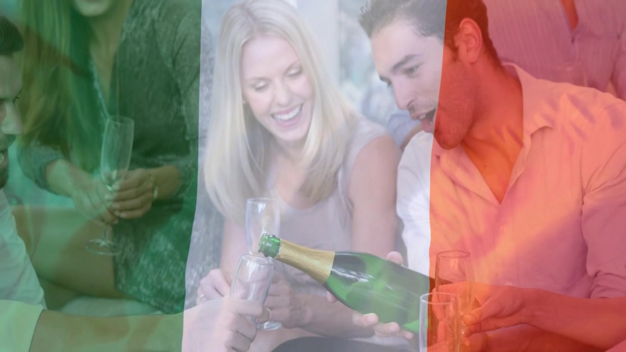 Man popping cork on bubbly bottle pouring flutes on sofa tricolor overlay tinting group celebrating