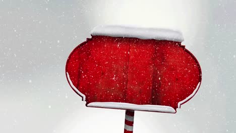 animation of snow falling over wooden sign with copy space