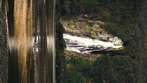 Lady-Bowen-Falls-in-Milford-Sound,-Vertical-video-in-slow-motion