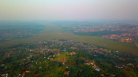 nabajuzi river and city of masaka at dusk in uganda, africa. - aerial shot