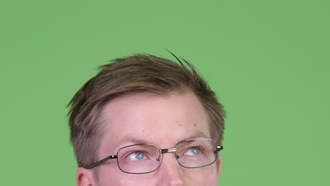 close-up of man doctor thinking and looking up