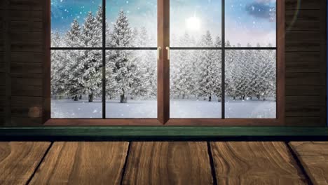 Animation of winter christmas scenery with snow falling over trees and sun shining