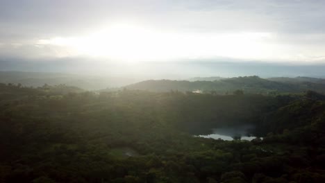 Dramatic-Sunrise-Over-Green-Lush-Mountains-And-Crater-Lake-In-Fort-Portal,-Uganda