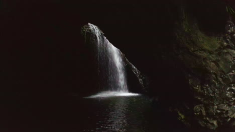 waterfall in a dark cave