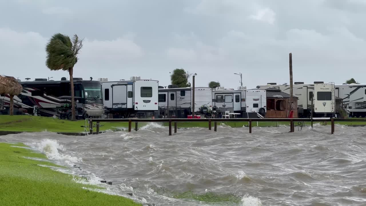 Hurricane Waves Crashing Over RVs in Campground
