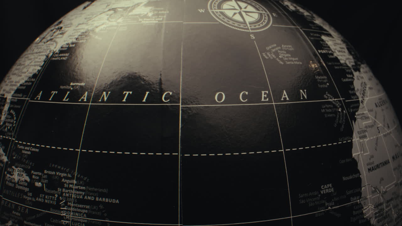 Close up of a black and white world globe