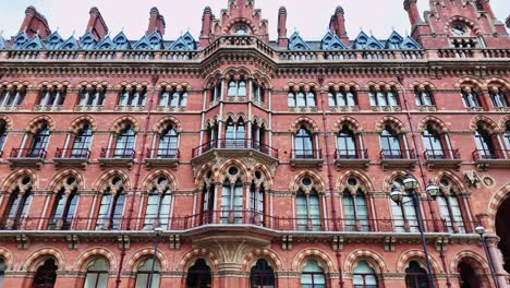 st pancras railway station exterior facade, london. panning