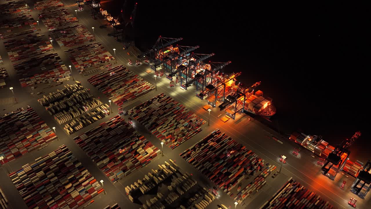 Aerial view of a container port at night