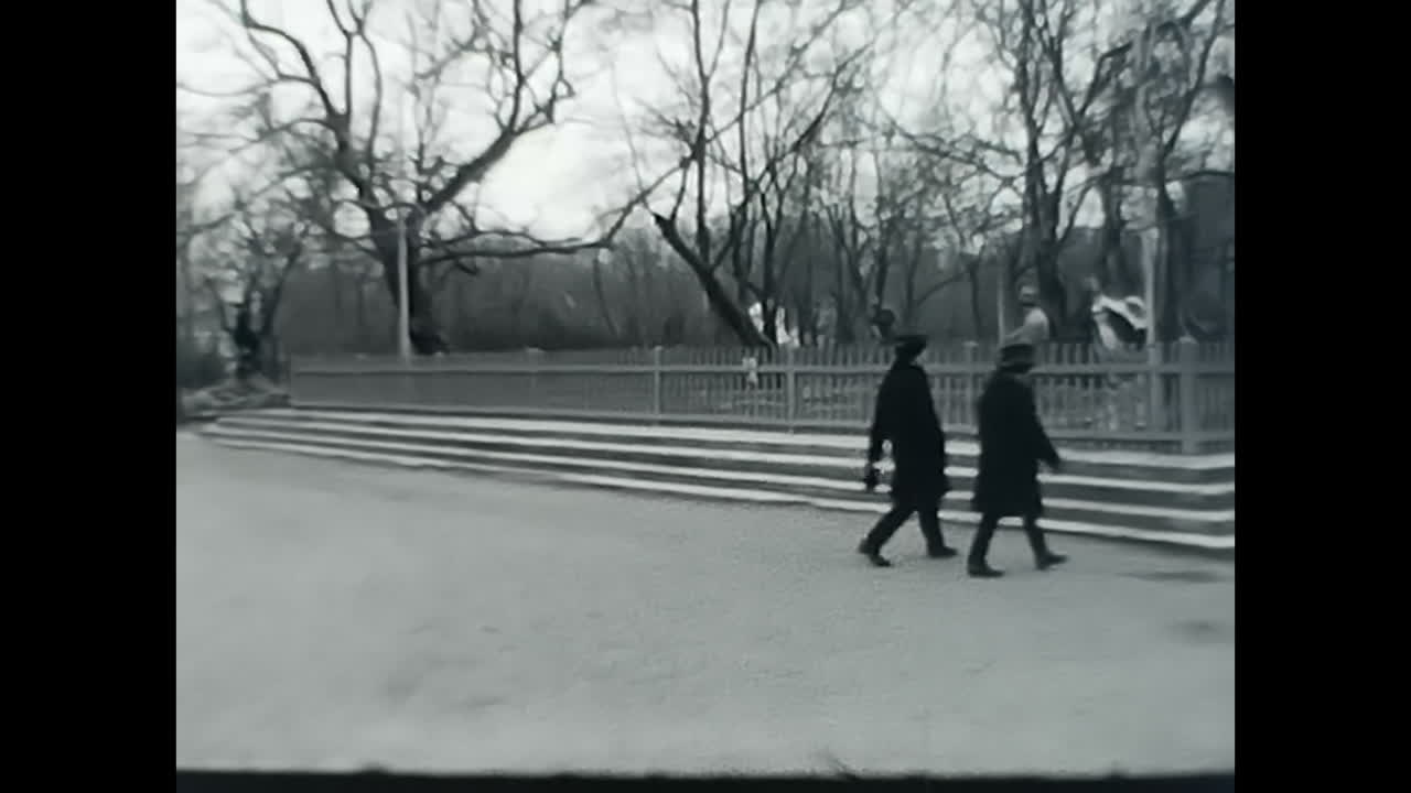 Group of Pedestrians Strolling Along a Busy Street in the Soviet Union. CIRCA USSR 1970: A diverse group of individuals journeying on foot down a bustling street in the era of Soviet socialism.