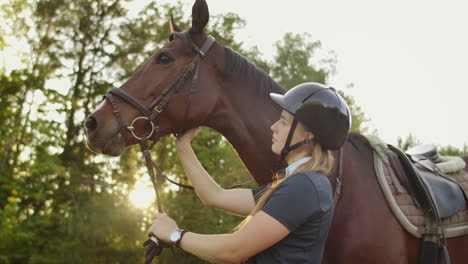 It's-enjoyable-moments-with-lovely-horse.-Young-women-is-stroking-her-brown-horse-when-they-walk-together.-These-are-amazing-feelings-and-warm-smile.