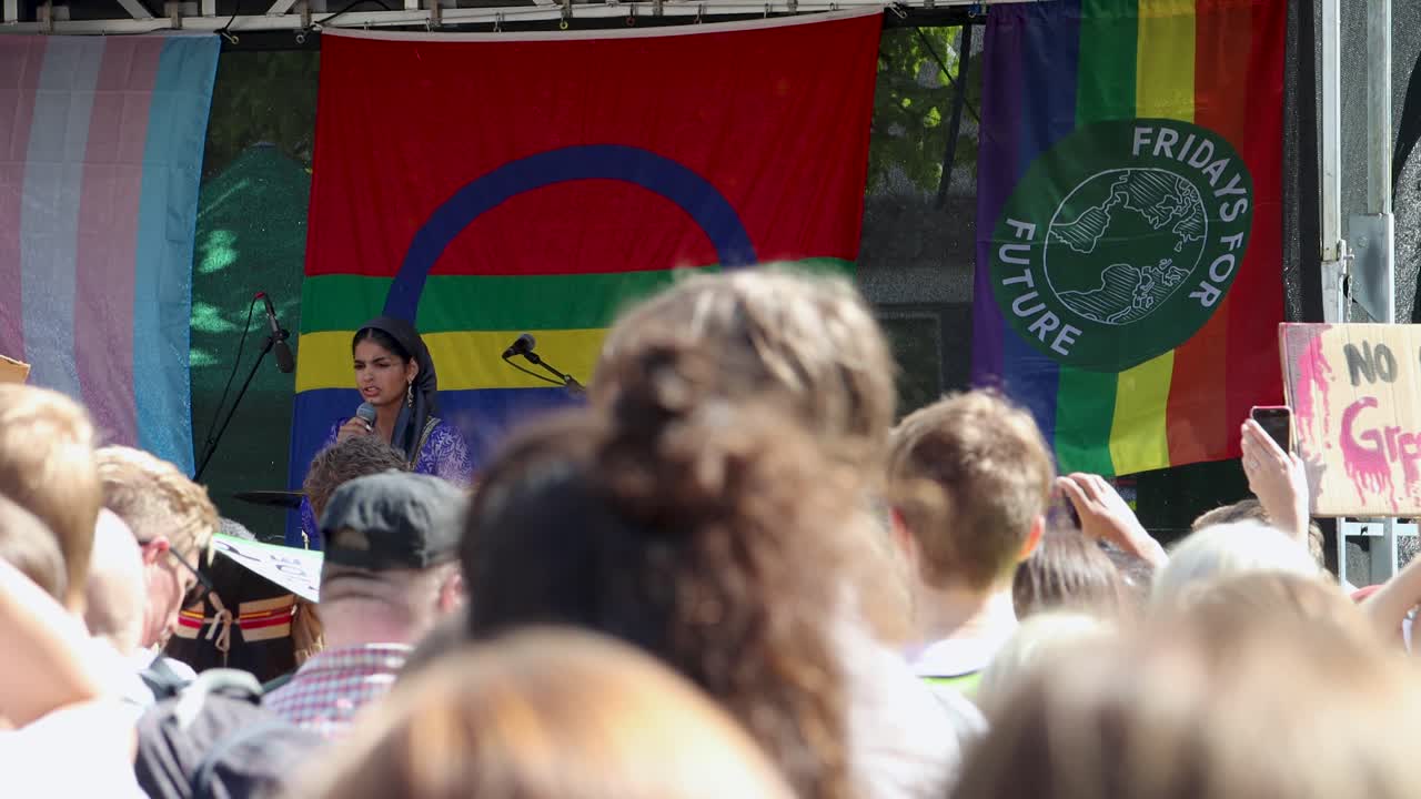 Crowded People And Fridays For Future Flag At Climate Rally In Sweden. Selective Focus Shot