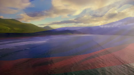 animation of flag of colombia blowing over beach landscape