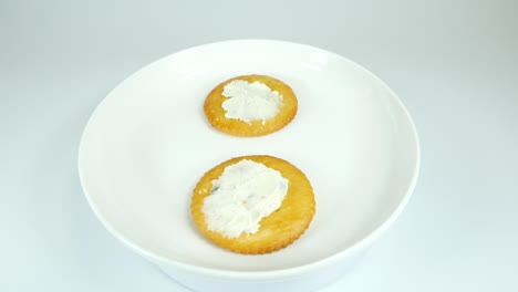 round crackers with herb cheese