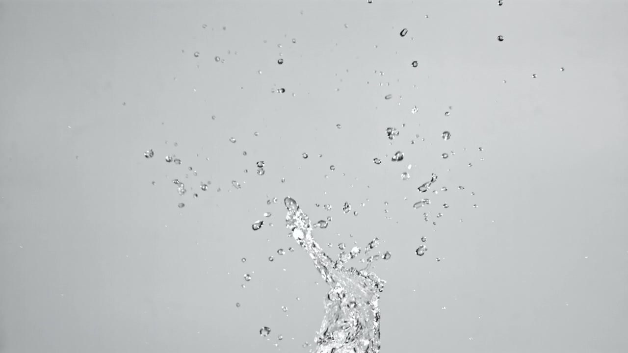 Dynamic Water Splash with Flying Droplets in Slow Motion