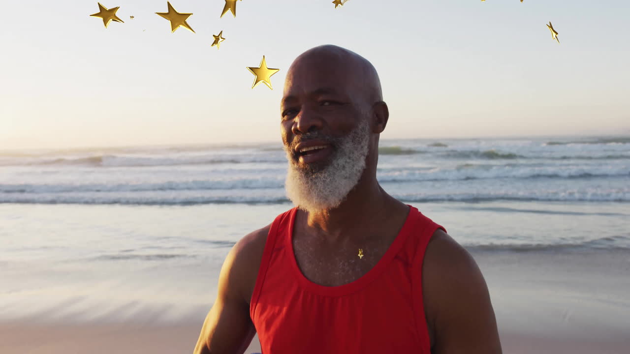 Man standing calmly on sandy beach at sunrise, showcasing health concept with floating golden stars